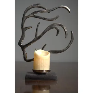 Metal face candle stand